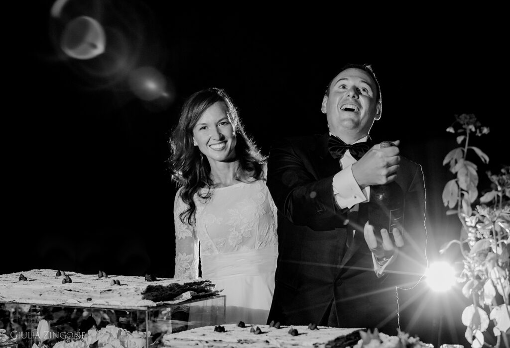 this is a picture of the bride and groom during reception by villa cipressi wedding photographer at lake como giulia zingone