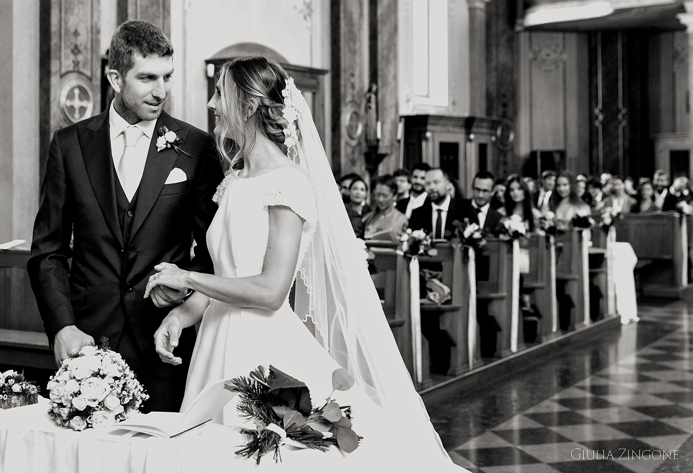 this is a picture of the church ceremony by cortina wedding photographer giulia zingone