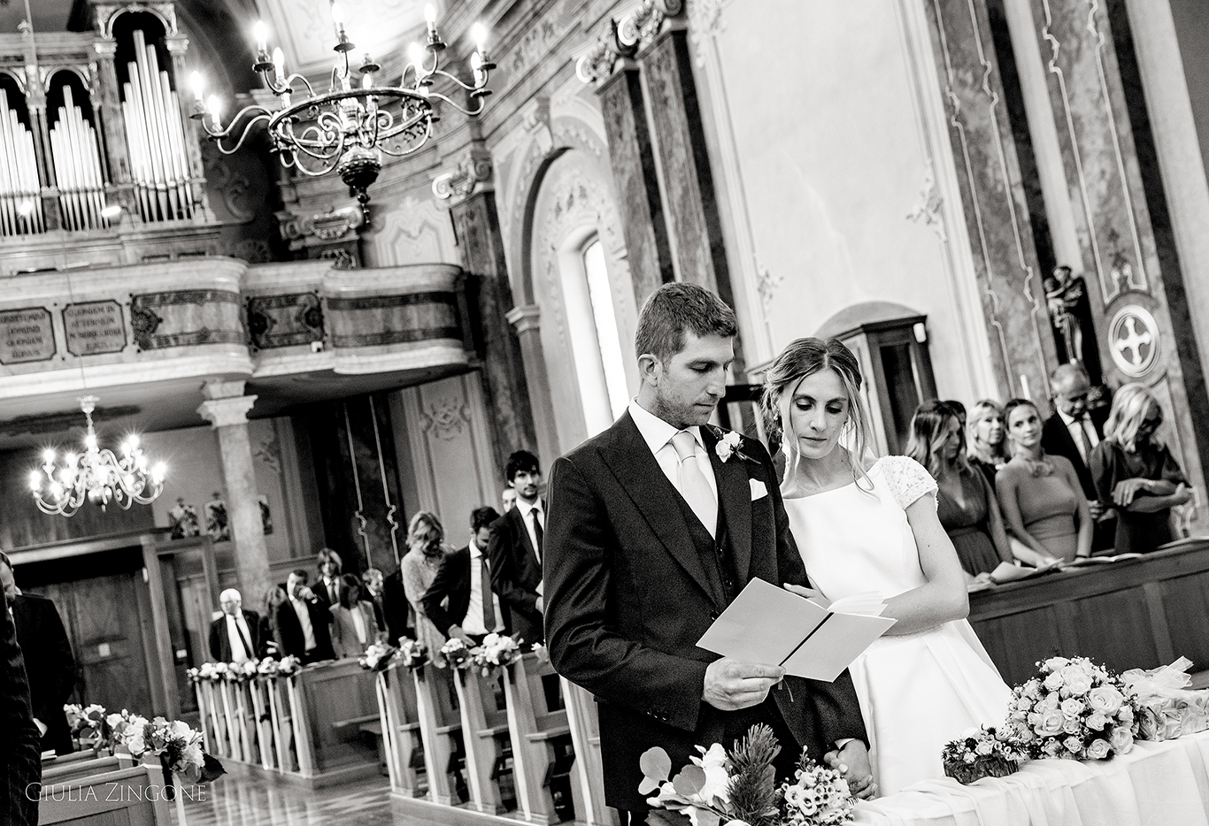 this is a picture of the church ceremony by cortina wedding photographer giulia zingone