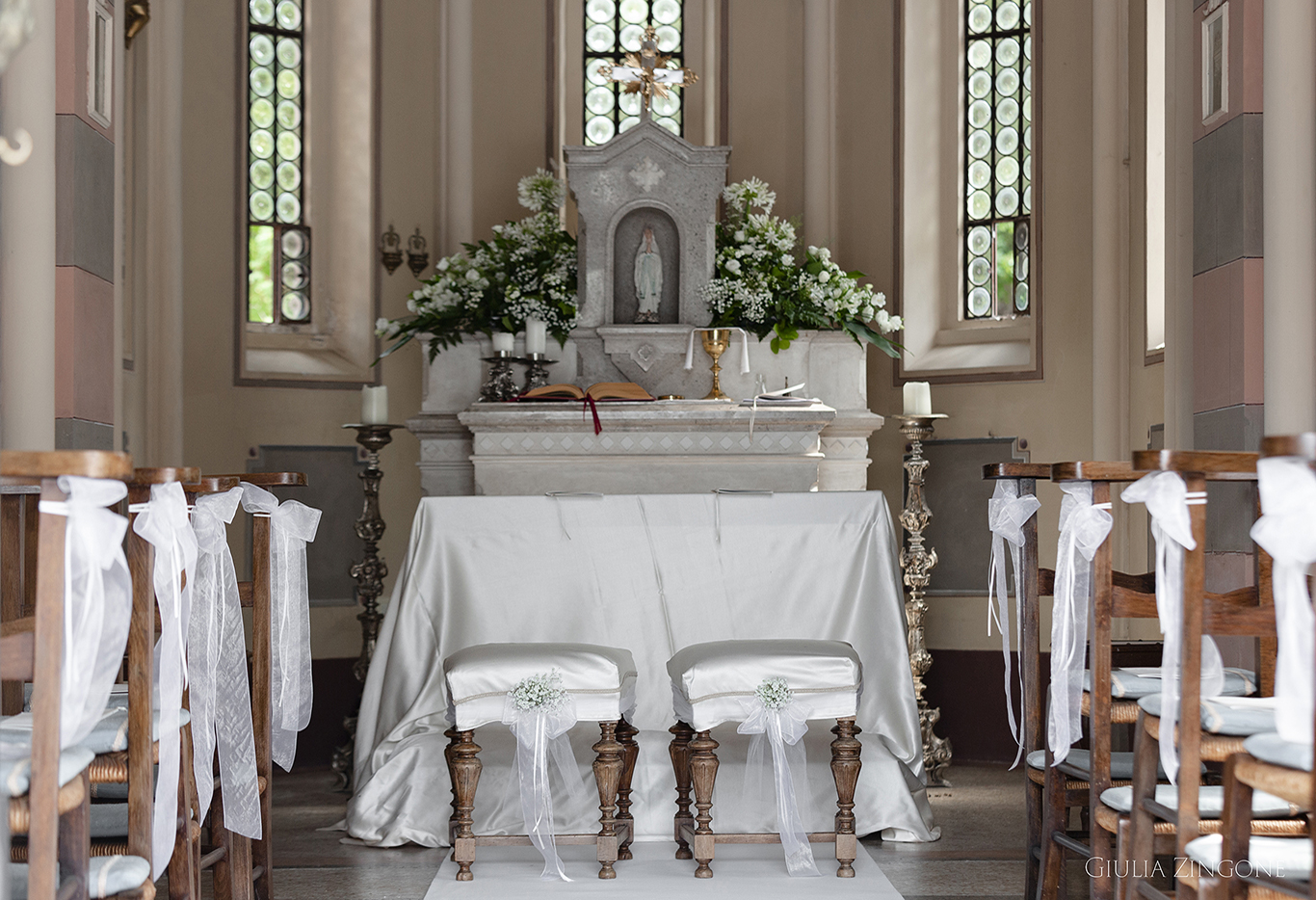 this is a picture of the church ceremony by spessa castle wedding photographer giulia zingone
