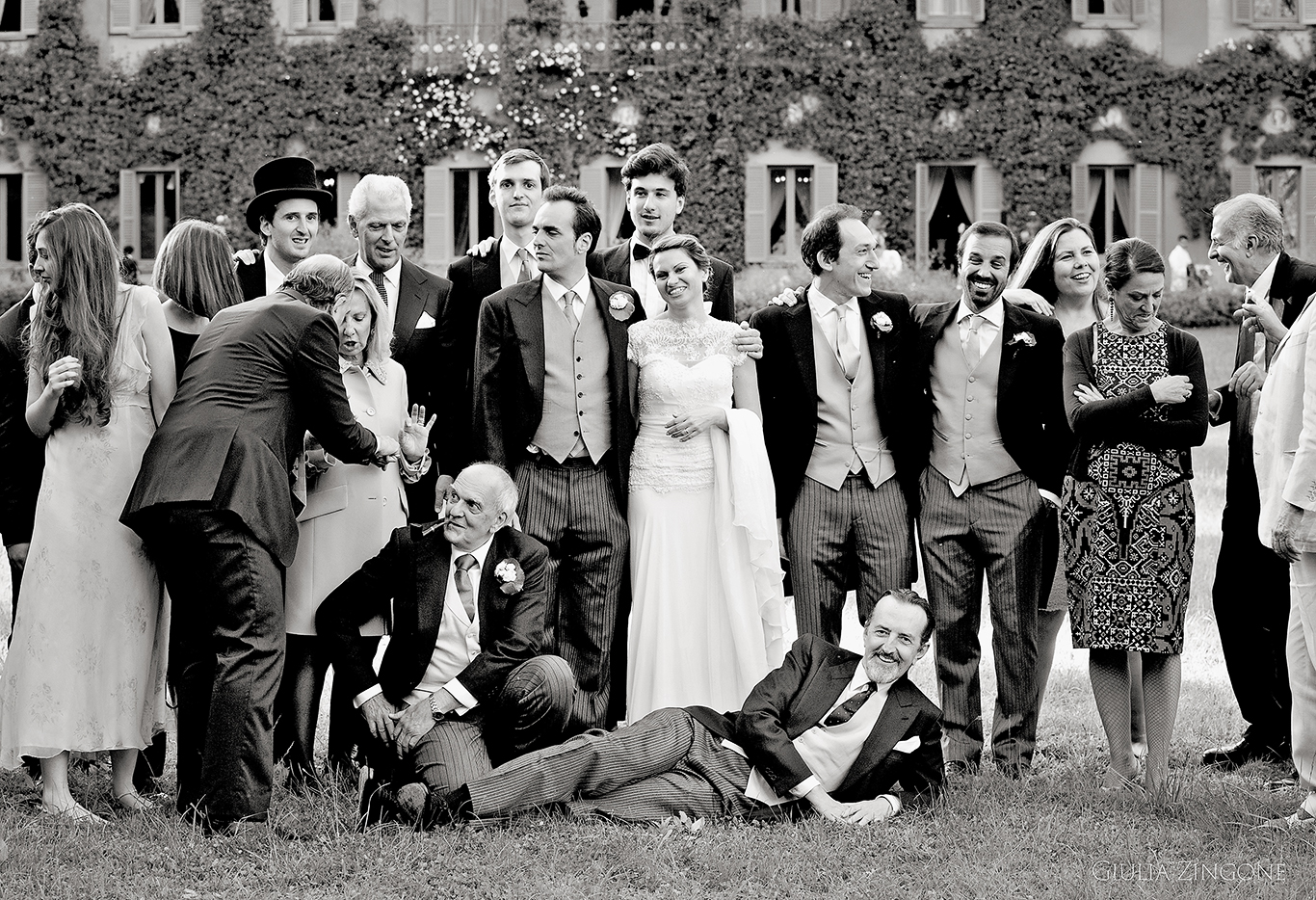 this picture is a candid shot of a family and friends group from the reception by villa erba cernobbio wedding photographer in lake como giulia zingone