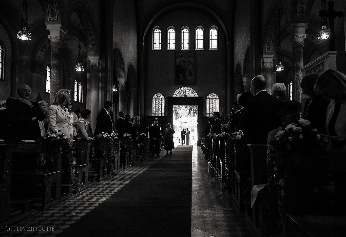 this picture is a candid shot from the church ceremony by villa erba cernobbio wedding photographer in lake como giulia zingone