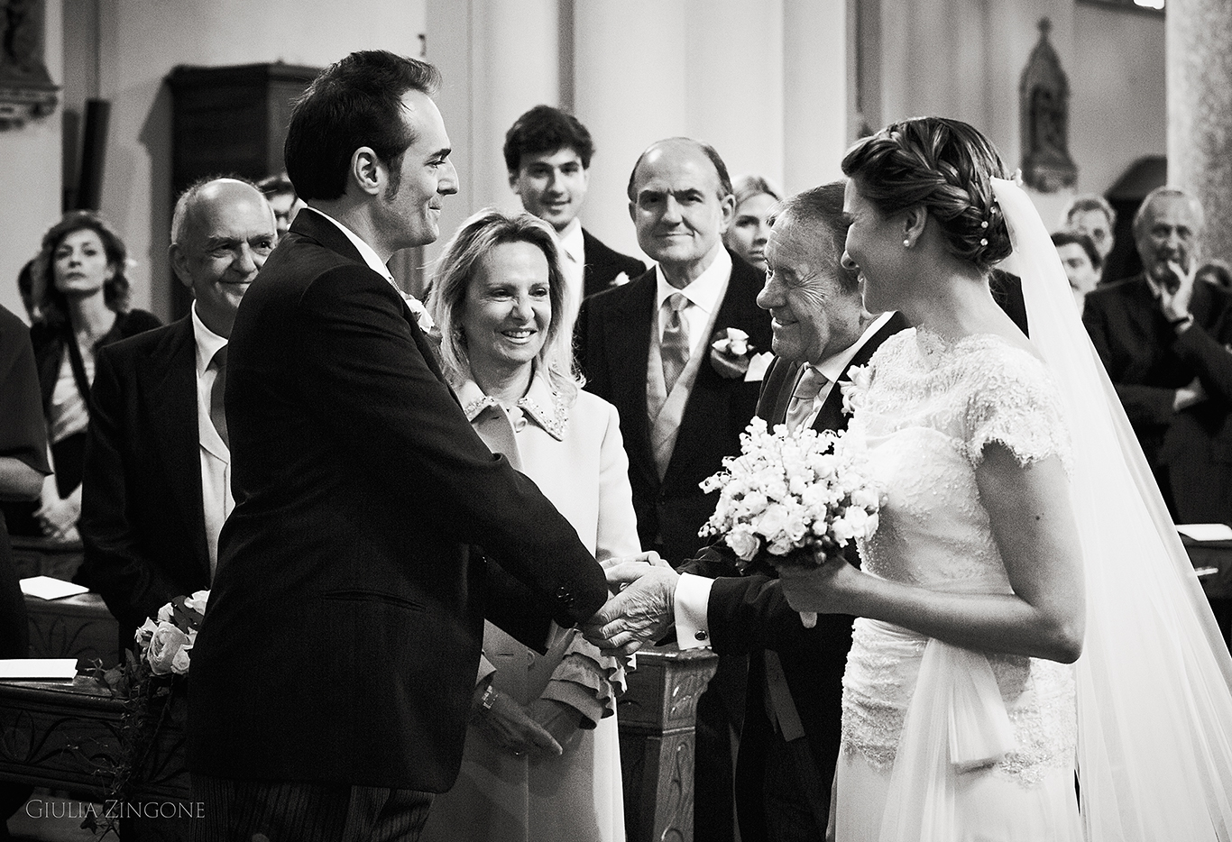 this picture is a candid shot from the church ceremony by villa erba cernobbio wedding photographer in lake como giulia zingone