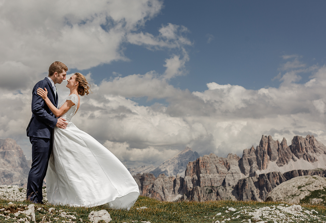this is a portrait of the bride and groom in the dolomites mountains by cortina wedding photographer giulia zingone