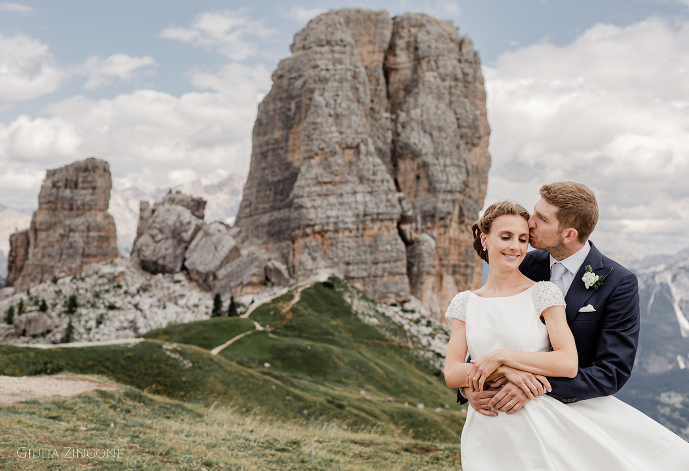 this is a portrait of the bride and groom in the dolomites mountains by cortina wedding photographer giulia zingone