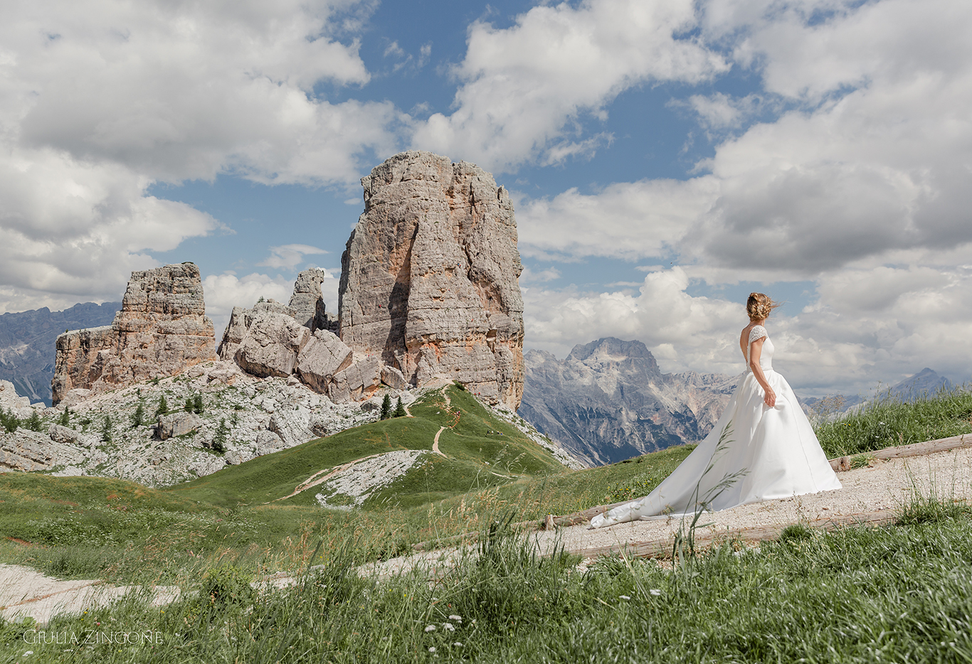 this is a portrait of the bride and groom in the dolomites mountains by cortina wedding photographer giulia zingone