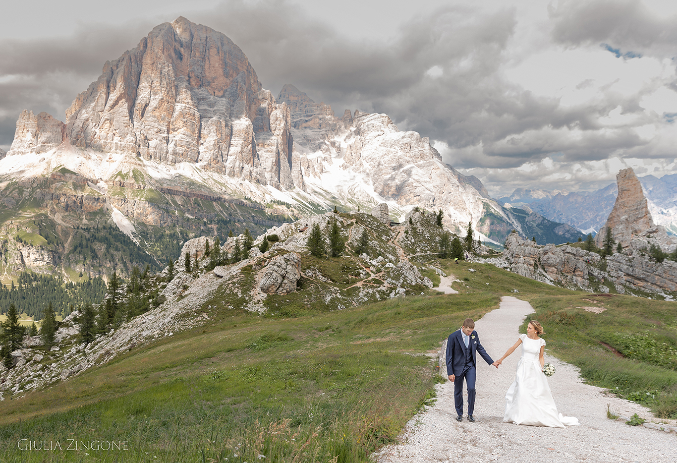 this is a portrait of the bride and groom in the dolomites mountains by cortina wedding photographer giulia zingone