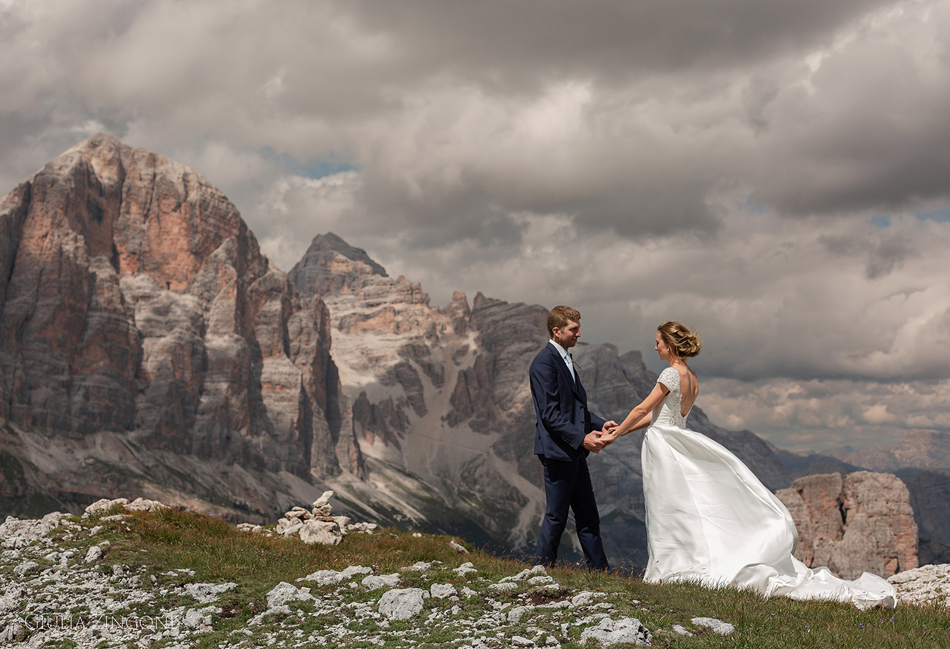 this is a portrait of the bride and groom in the dolomites mountains by cortina wedding photographer giulia zingone