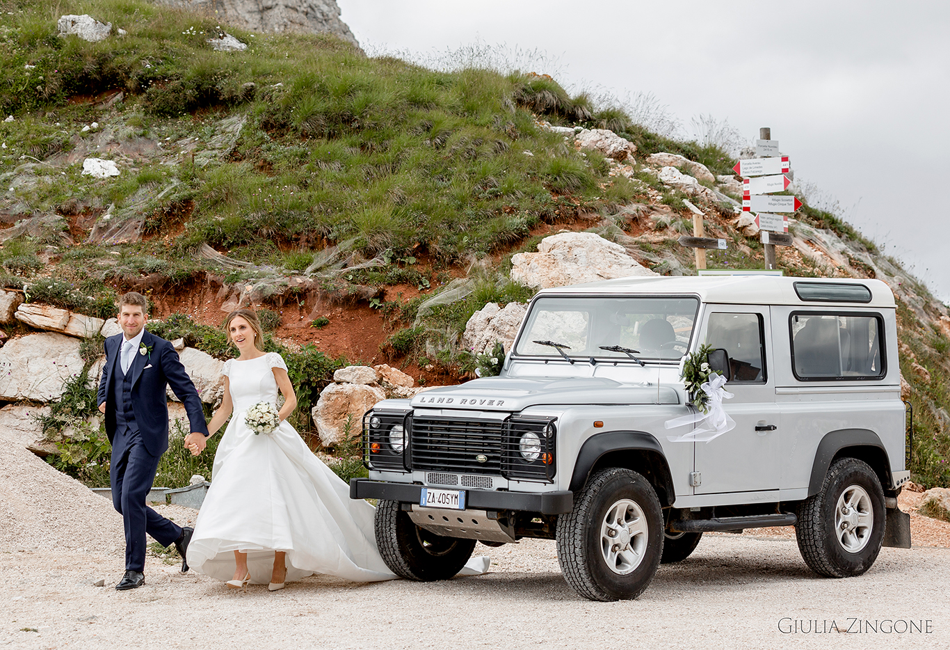 this is a portrait of the bride and groom in the dolomites mountains by cortina wedding photographer giulia zingone