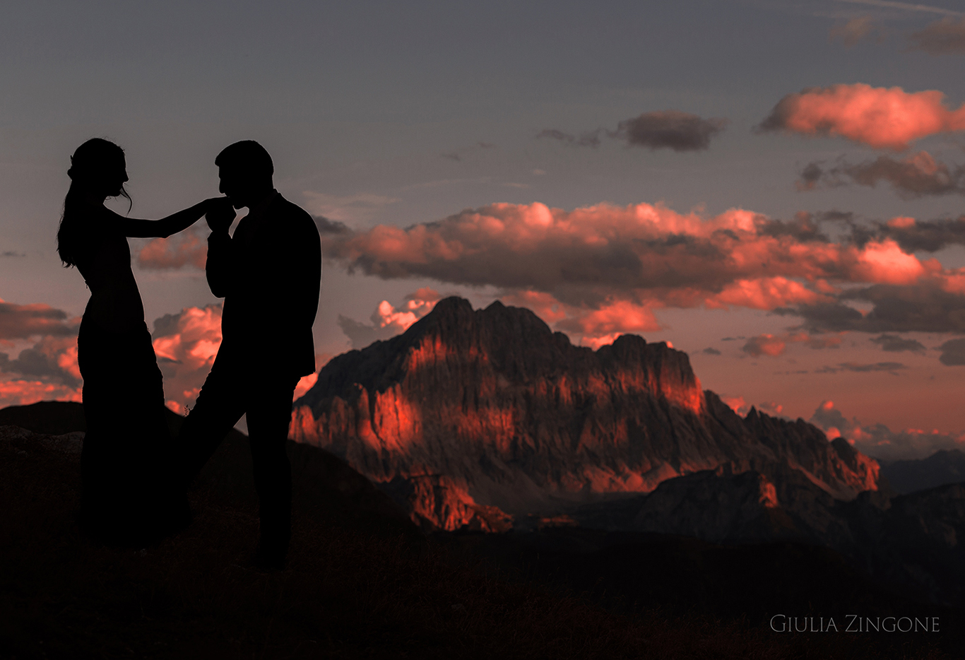 this is a portrait of the bride and groom in the dolomites at sunset by cortina wedding photographer giulia zingone